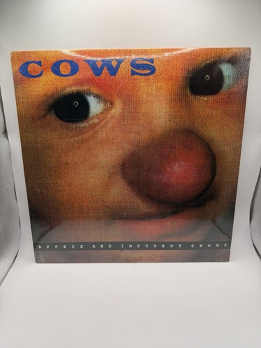 Cows effete and - -, impudent